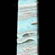Aqua Blue Caribbean Calcite obelisk 292g in sunight - Rocks and Things Store