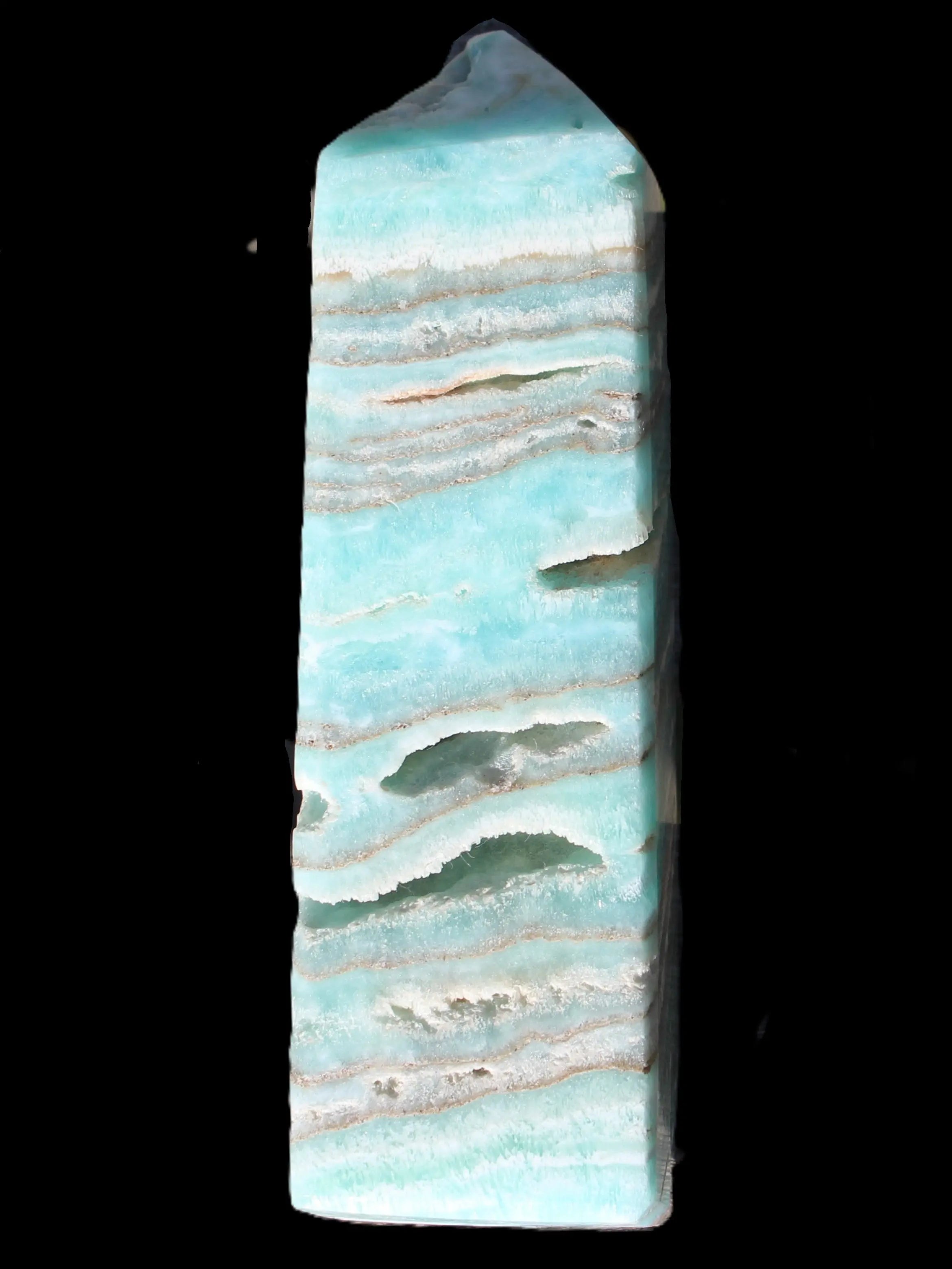 Aqua Blue Caribbean Calcite obelisk 292g in sunight - Rocks and Things Store