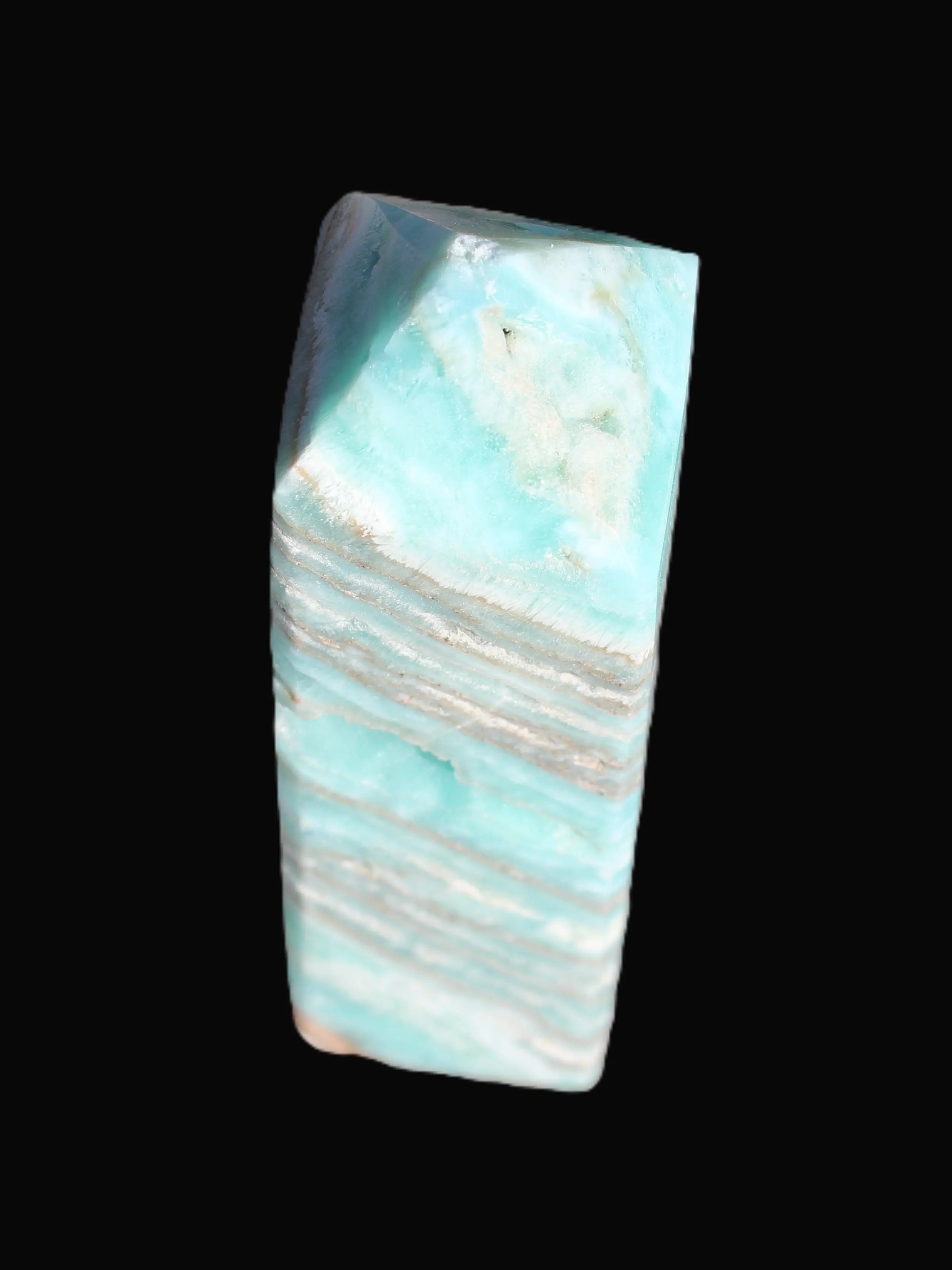 Aqua Blue Caribbean Calcite obelisk 292g in sunight - Rocks and Things Store