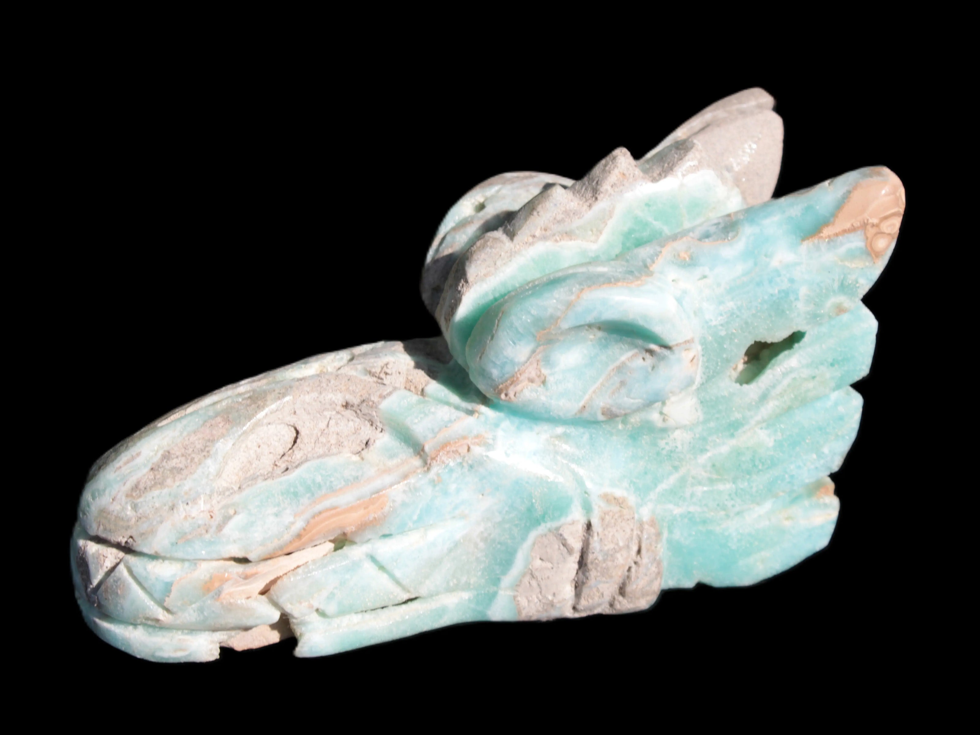 Caribbean Calcite hand-carved dragon's head 675g Rocks and Things Store