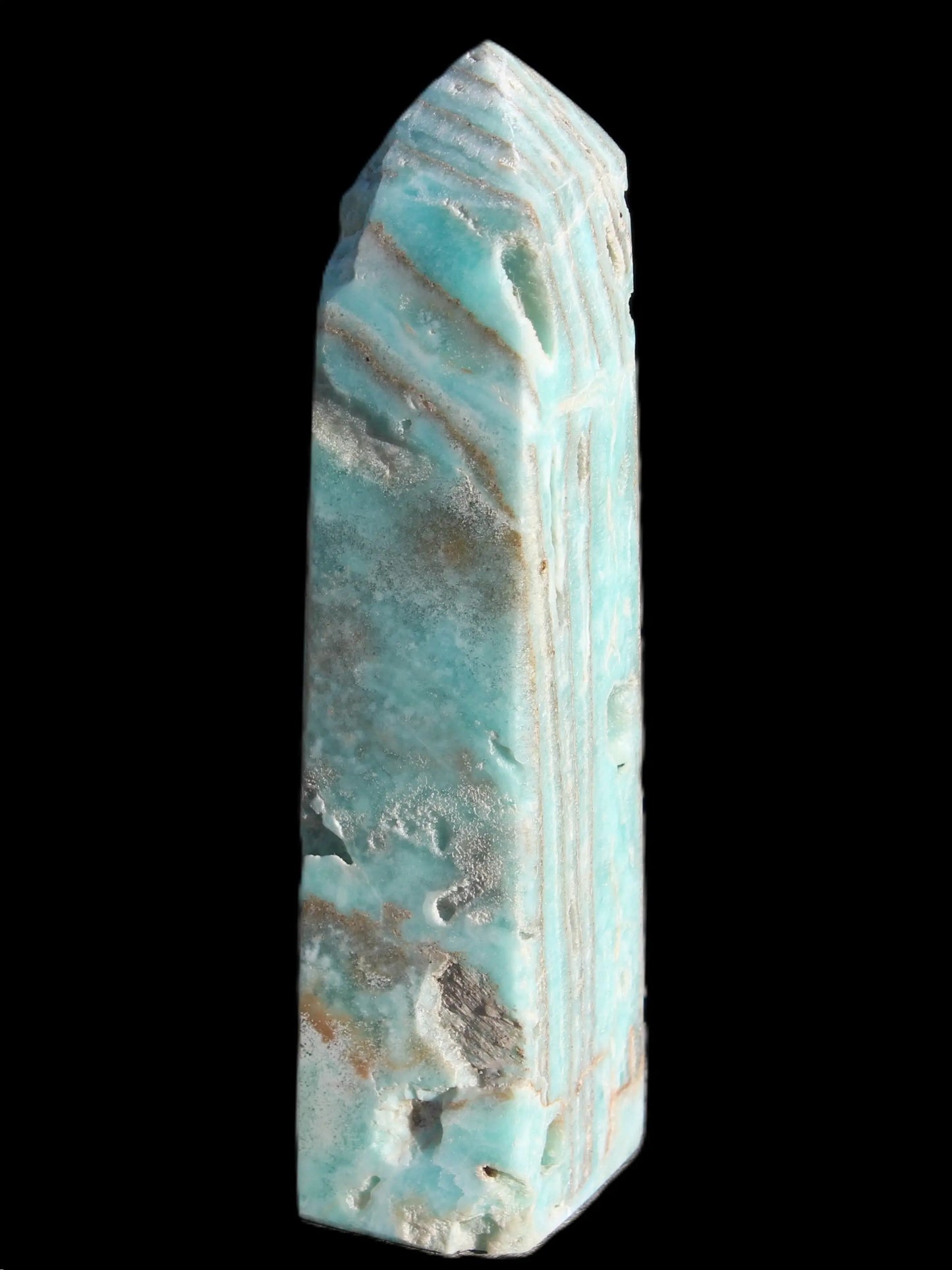 Caribbean Calcite aqua blue obelisk 170mm 539g in sunlight - Rocks and Things Store