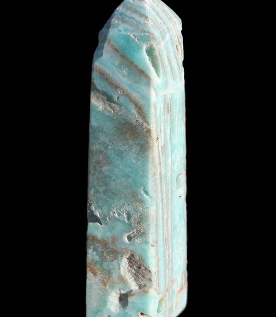 Caribbean Calcite aqua blue obelisk 170mm 539g in sunlight - Rocks and Things Store