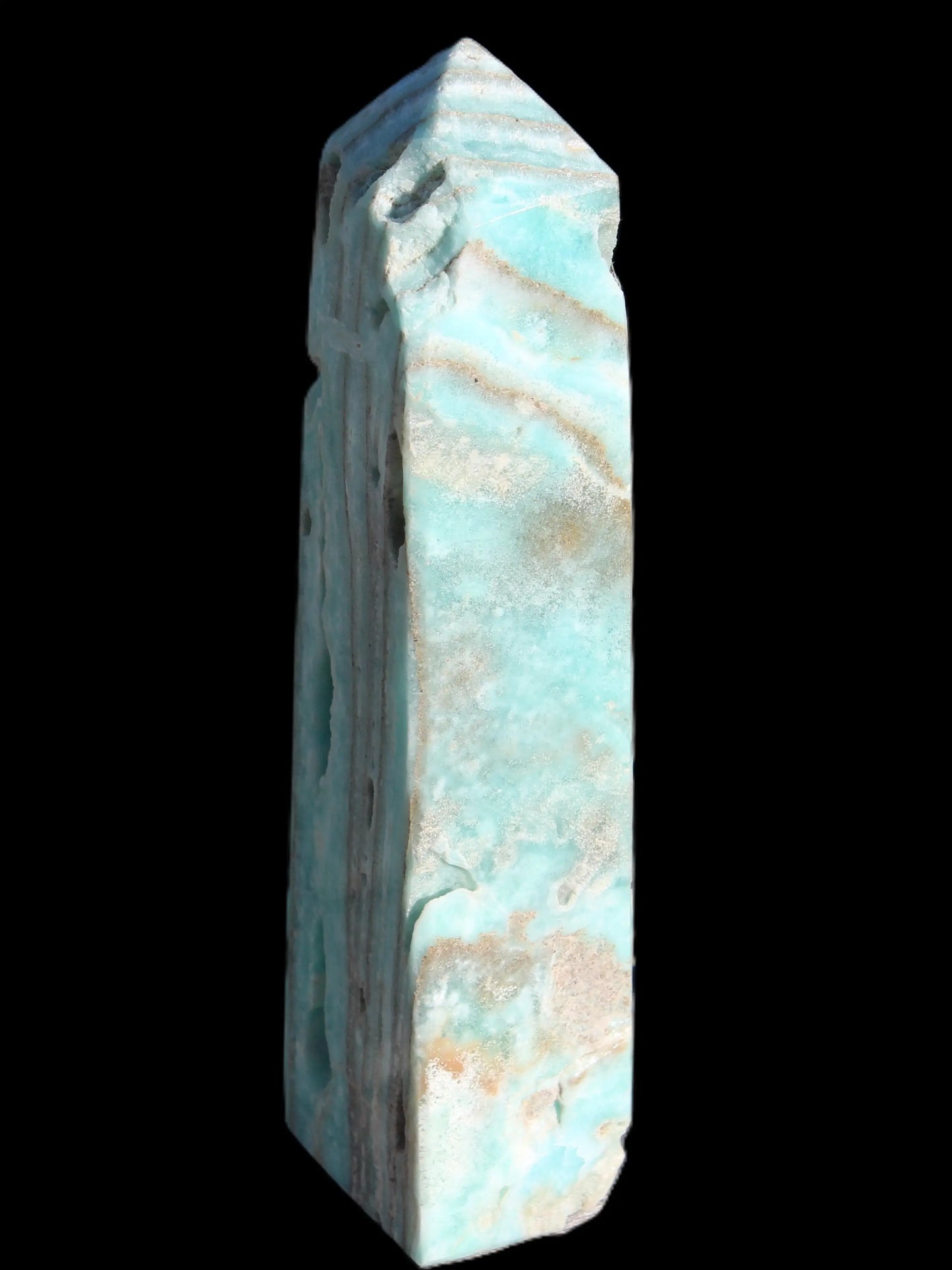 Caribbean Calcite aqua blue obelisk 170mm 539g in sunlight - Rocks and Things Store