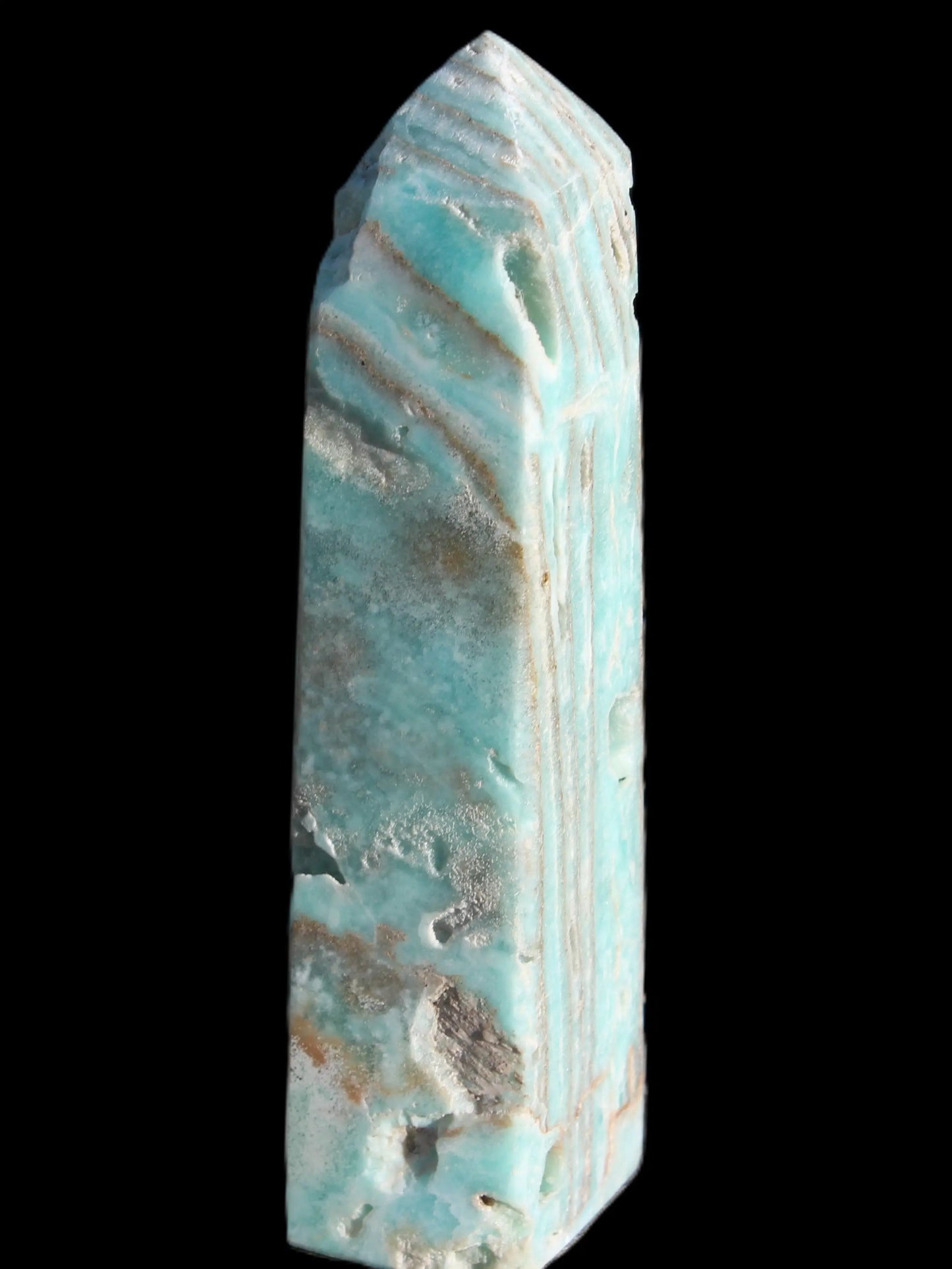 Caribbean Calcite aqua blue obelisk 170mm 539g in sunlight - Rocks and Things Store