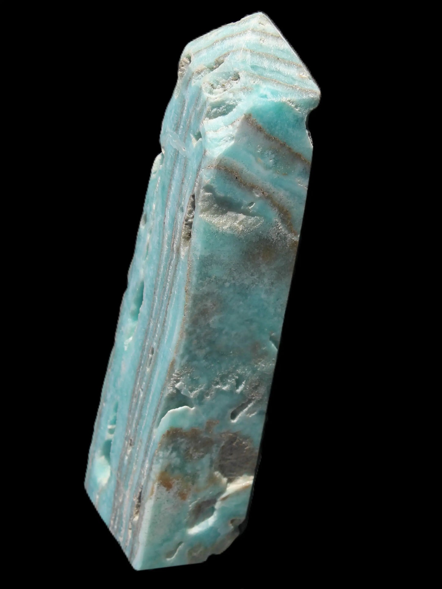 Caribbean Calcite aqua blue obelisk 170mm 539g in sunlight - Rocks and Things Store