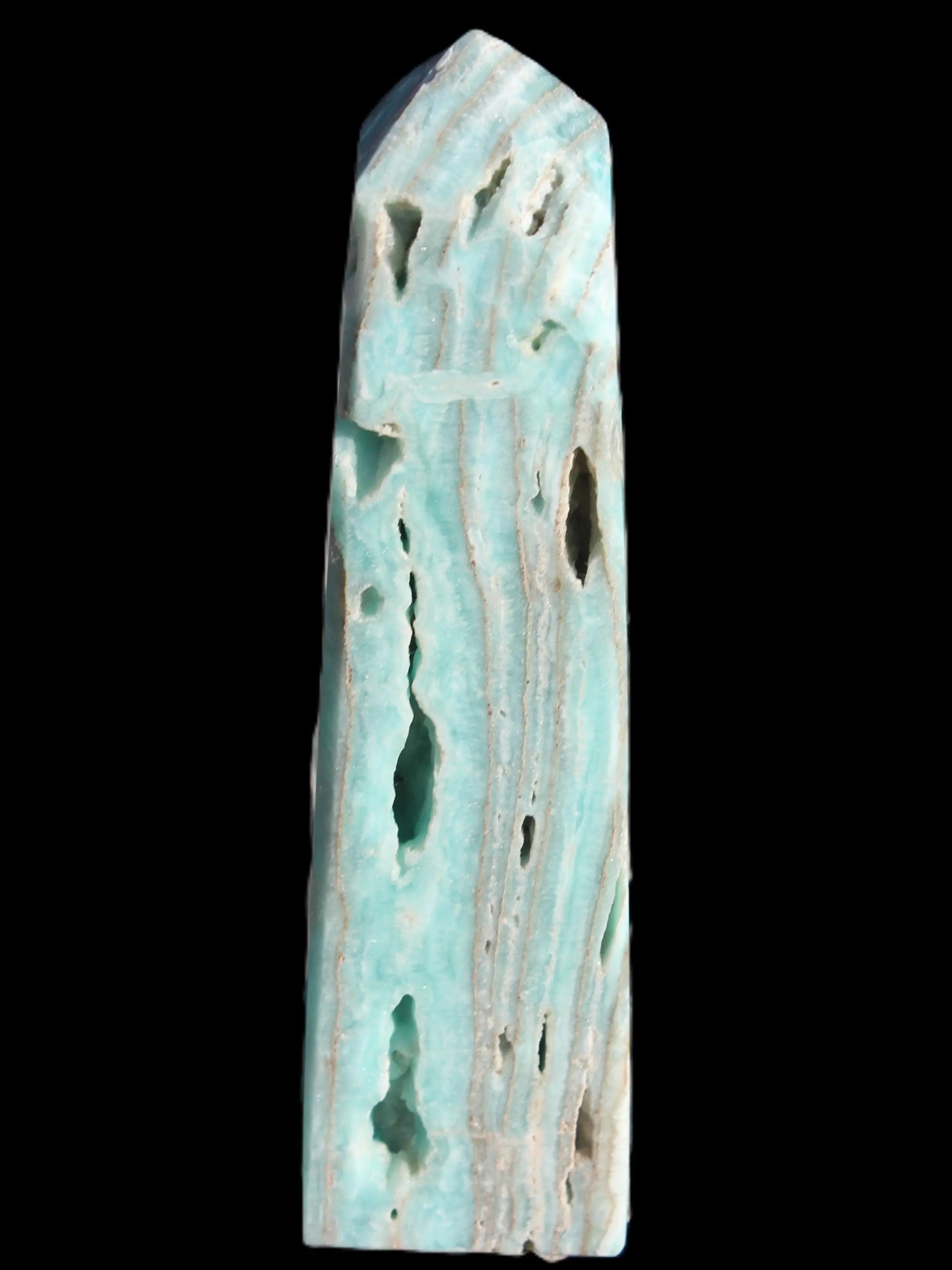 Caribbean Calcite aqua blue obelisk 170mm 539g in sunlight - Rocks and Things Store