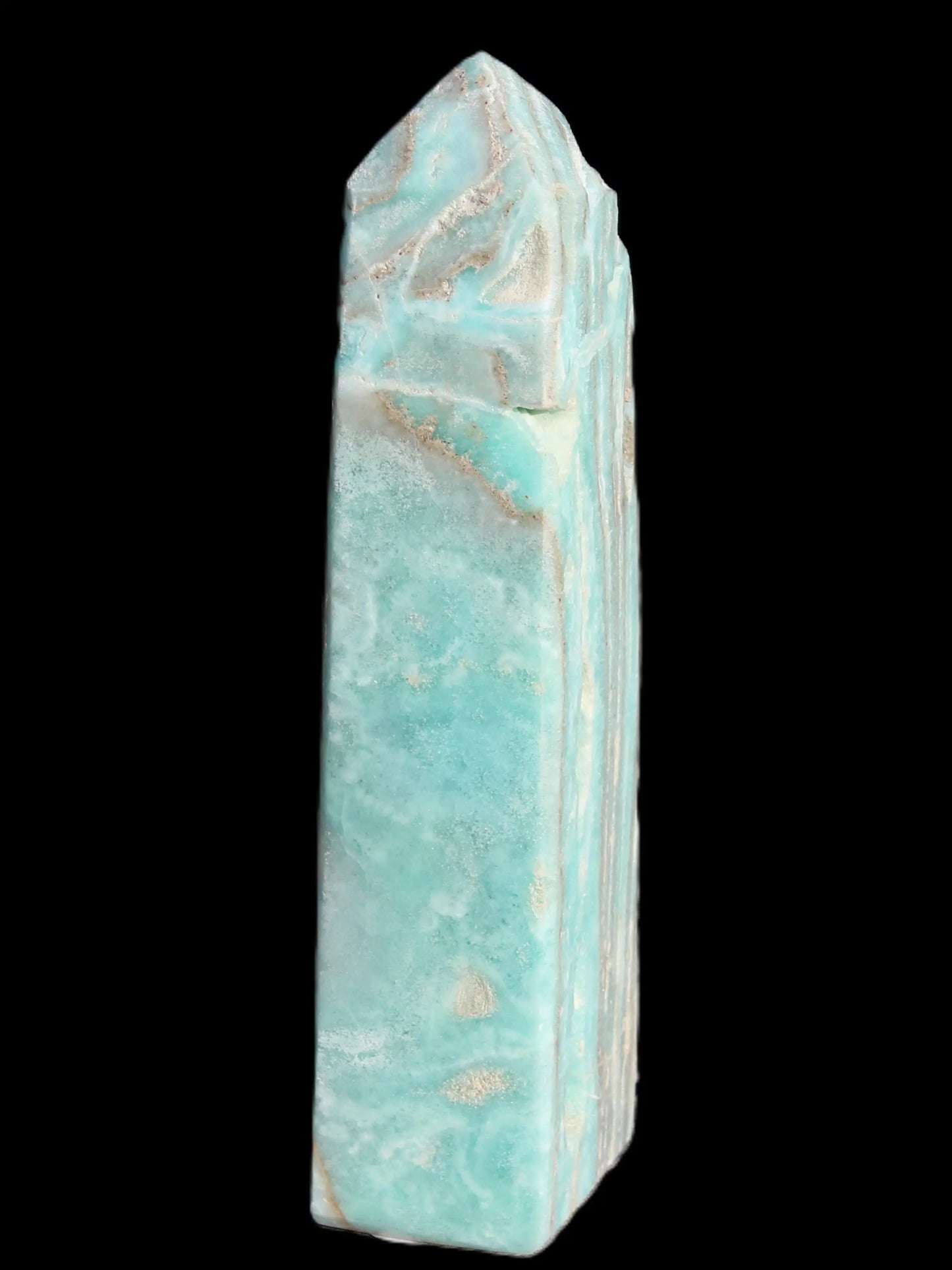 Caribbean Calcite aqua blue obelisk 170mm 539g in sunlight - Rocks and Things Store