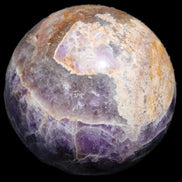 Chevron Fantasy Amethyst sphere 1424g in sunlight - Rocks and Things Store