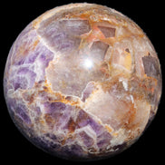 Chevron Fantasy Amethyst sphere 1424g in sunlight - Rocks and Things Store