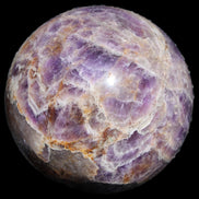 Chevron Fantasy Amethyst sphere 1424g in sunlight - Rocks and Things Store