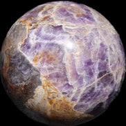 Chevron Fantasy Amethyst sphere 1424g in sunlight - Rocks and Things Store
