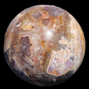 Chevron Fantasy Amethyst sphere 1424g in sunlight - Rocks and Things Store