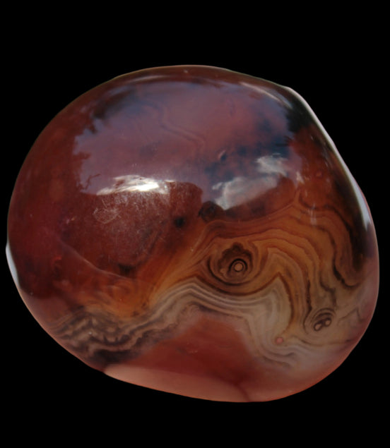 Crazy Lace Silk Banded Agate tumbled stone from Madagascar 60g in sunlight - Rocks and Things Store