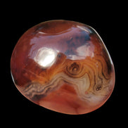 Crazy Lace Silk Banded Agate tumbled stone from Madagascar 60g in sunlight - Rocks and Things Store