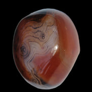 Crazy Lace Silk Banded Agate tumbled stone from Madagascar 60g in sunlight - Rocks and Things Store