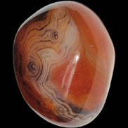 Crazy Lace Silk Banded Agate tumbled stone from Madagascar 60g in sunlight - Rocks and Things Store