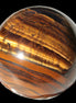 Golden and Red Tigers Eye sphere 82g in sunlight -  Rocks and Things Store