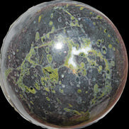 Green Plum Blossom Jade sphere 132mm 3460g in sunlight - Rocks and Things Store