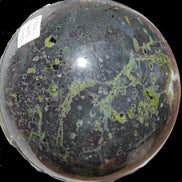 Green Plum Blossom Jade sphere 132mm 3460g in sunlight - Rocks and Things Store