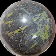 Green Plum Blossom Jade sphere 132mm 3460g in sunlight - Rocks and Things Store