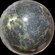 Green Plum Blossom Jade sphere 132mm 3460g in sunlight - Rocks and Things Store