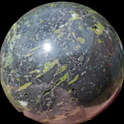 Green Plum Blossom Jade sphere 132mm 3460g in sunlight - Rocks and Things Store