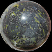 Green Plum Blossom Jade sphere 132mm 3460g in sunlight - Rocks and Things Store