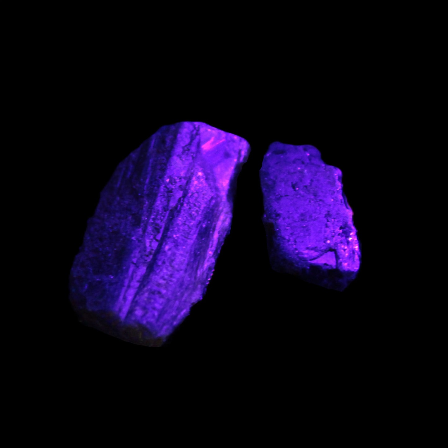 Green Tourmaline crystals 9-12g in UV light