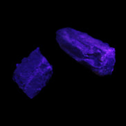 Green Tourmaline crystals 9-12g in UV light