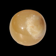 Honey Calcite sphere 47mm 162g in sunlight - Rocks and Things Store