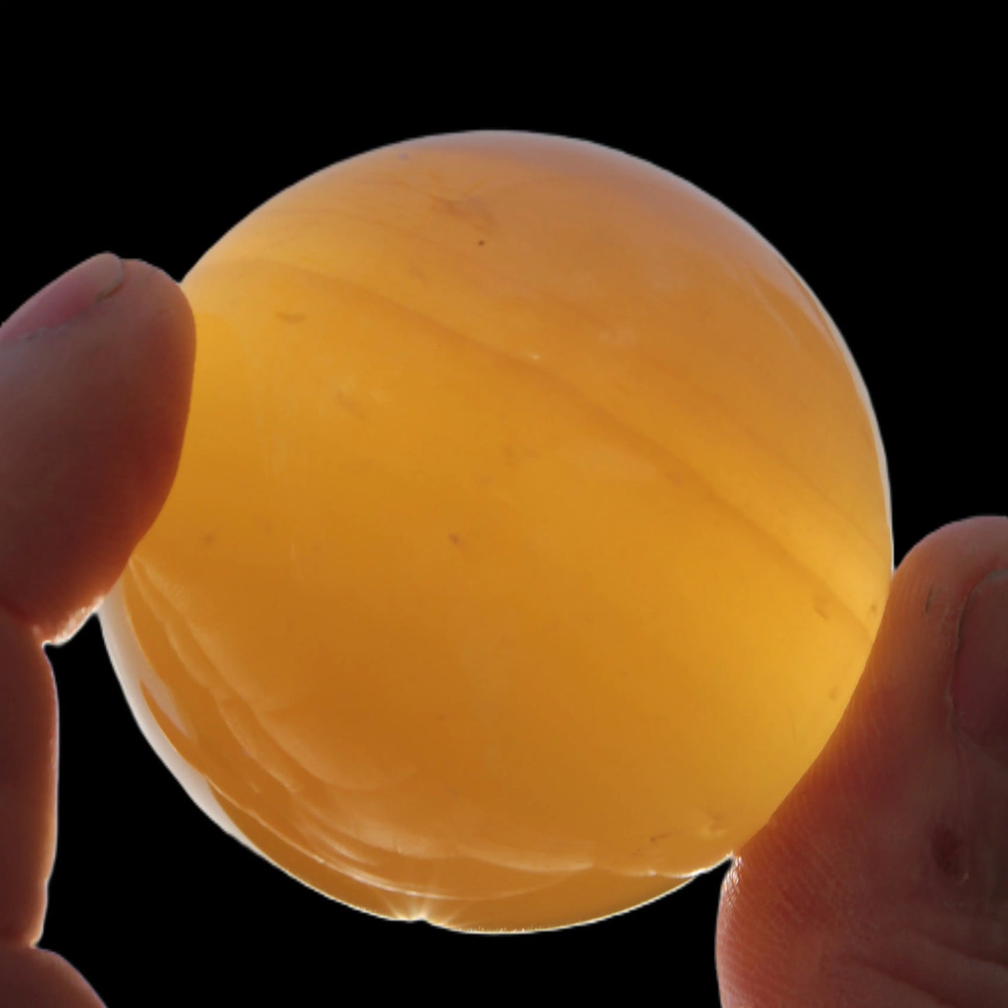 Honey Calcite sphere 47mm 162g Rocks and Things