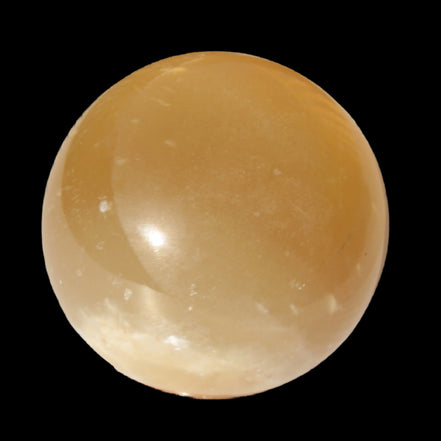 Honey Calcite sphere 47mm 162g in sunlight - Rocks and Things Store