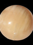 Honey Calcite sphere 49mm 167g in sunlight -  Rocks and Things Store