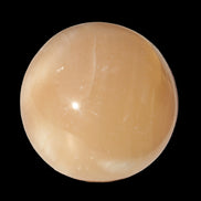 Honey Calcite sphere 49mm 167g in sunlight -  Rocks and Things Store