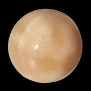 Honey Calcite sphere 49mm 167g in sunlight -  Rocks and Things Store