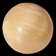 Honey Calcite sphere 49mm 167g in sunlight -  Rocks and Things Store
