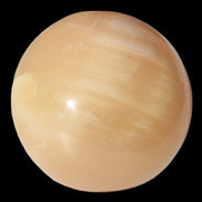 Honey Calcite sphere 49mm 167g in sunlight -  Rocks and Things Store