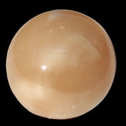 Honey Calcite sphere 49mm 167g in sunlight -  Rocks and Things Store