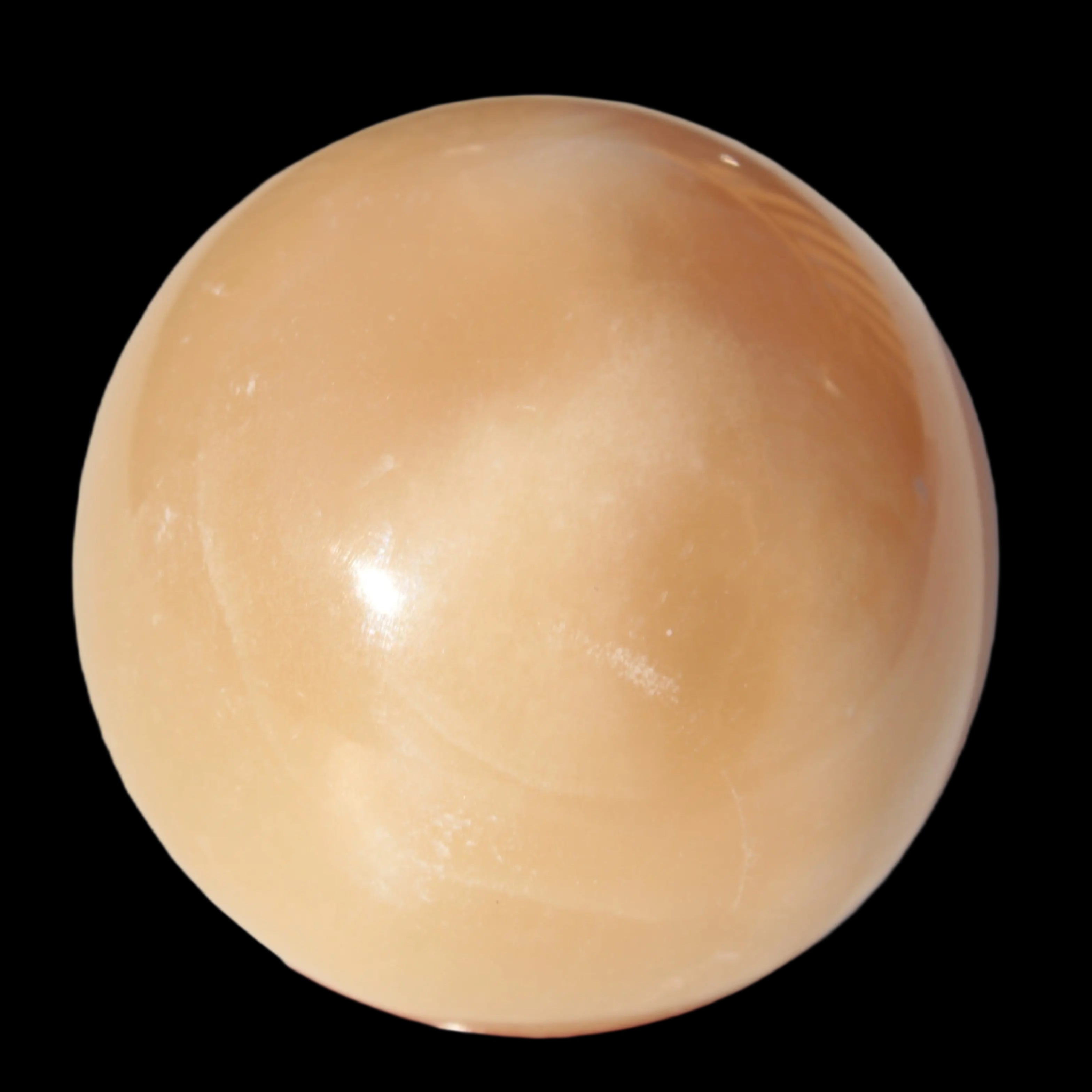 Honey Calcite sphere 49mm 167g in sunlight -  Rocks and Things Store