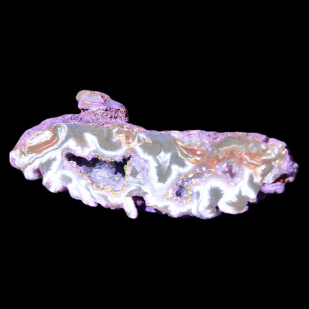 Violet dyed Agate geode 54*20*33mm 31g in sunlight - Rocks and Things Store