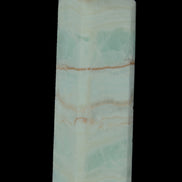 Pistachio Calcite obelisk 131*37*30mm 324g in sunlight - Rocks and Things Store