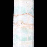 Pistachio Calcite obelisk 131*37*30mm 324g in sunlight - Rocks and Things Store