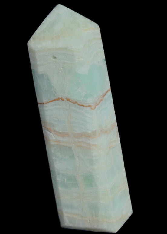 Pistachio Calcite obelisk 131*37*30mm 324g in sunlight - Rocks and Things Store