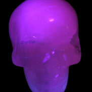 Mangano Calcite skull 40*55*45mm  160/161g in UV light - Rocks and Things Store
