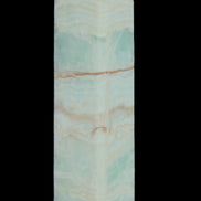 Pistachio Calcite obelisk 131*37*30mm 324g in sunlight - Rocks and Things Store