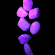 Small polished Kunzite crystals 6-8g in UV light