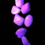 Small polished Kunzite crystals 6-8g in UV light