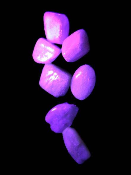 Small polished Kunzite crystals 6-8g in UV light