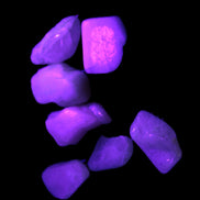 Small polished Kunzite crystals 6-8g in UV light
