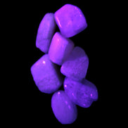 Small polished Kunzite crystals 6-8g in UV light